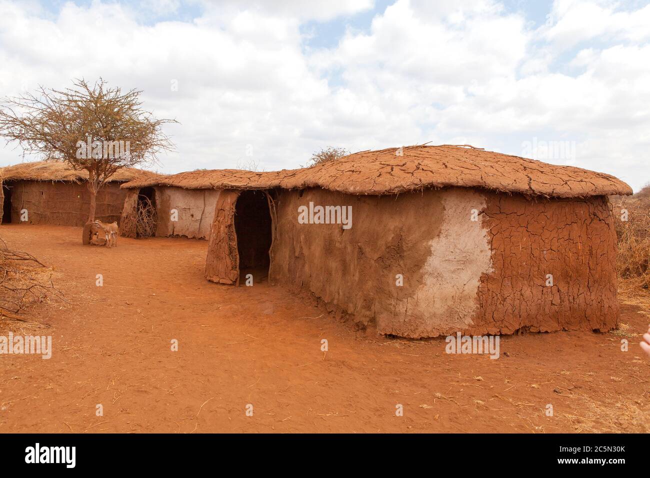 Traditional typical Masai Mara house in Kenya Stock Photo
