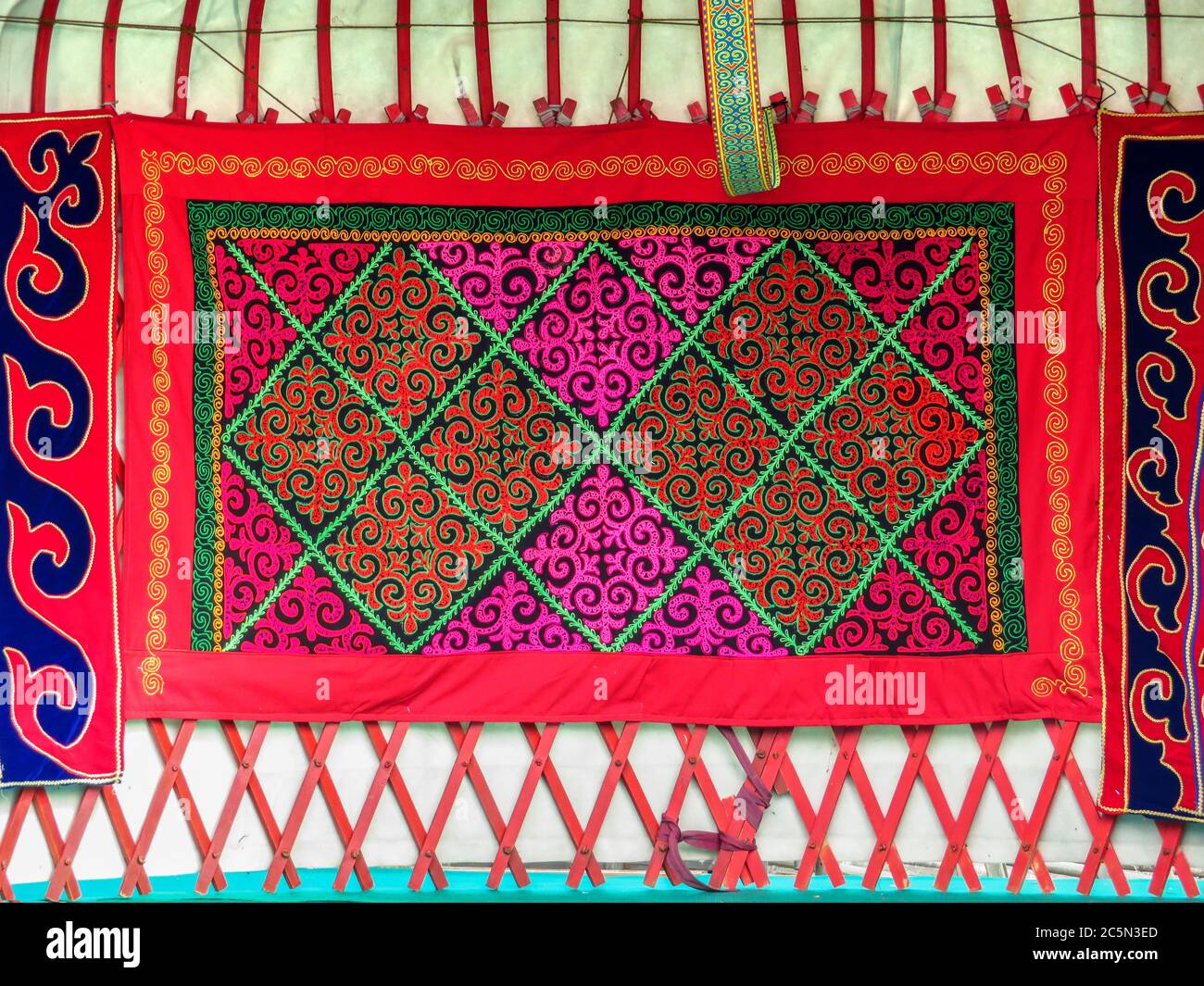 ALMATY, KAZAKHSTAN - MARCH 21, 2017: Kazakh felt carpet with ornament inside the yurt in Almaty, Kazakhstan  Almaty, Kazakhstan - March 21, 2017: Kaza Stock Photo