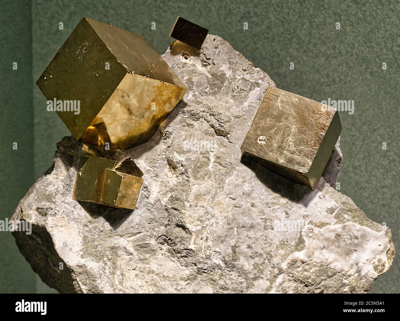 Pyrite cubic crystals embedded in a matrix Stock Photo