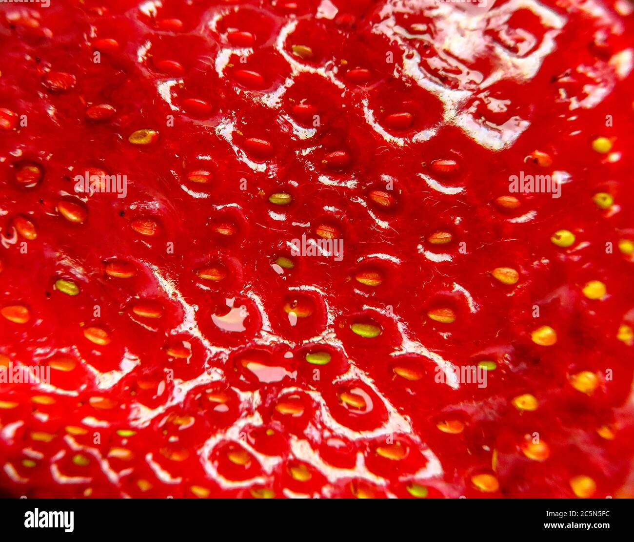 Macro photo of ripe red strawberry texture Stock Photo - Alamy
