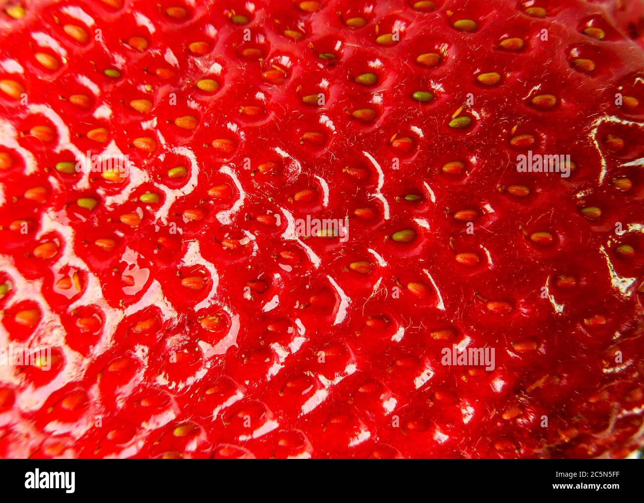 Macro photo of ripe red strawberry texture Stock Photo - Alamy