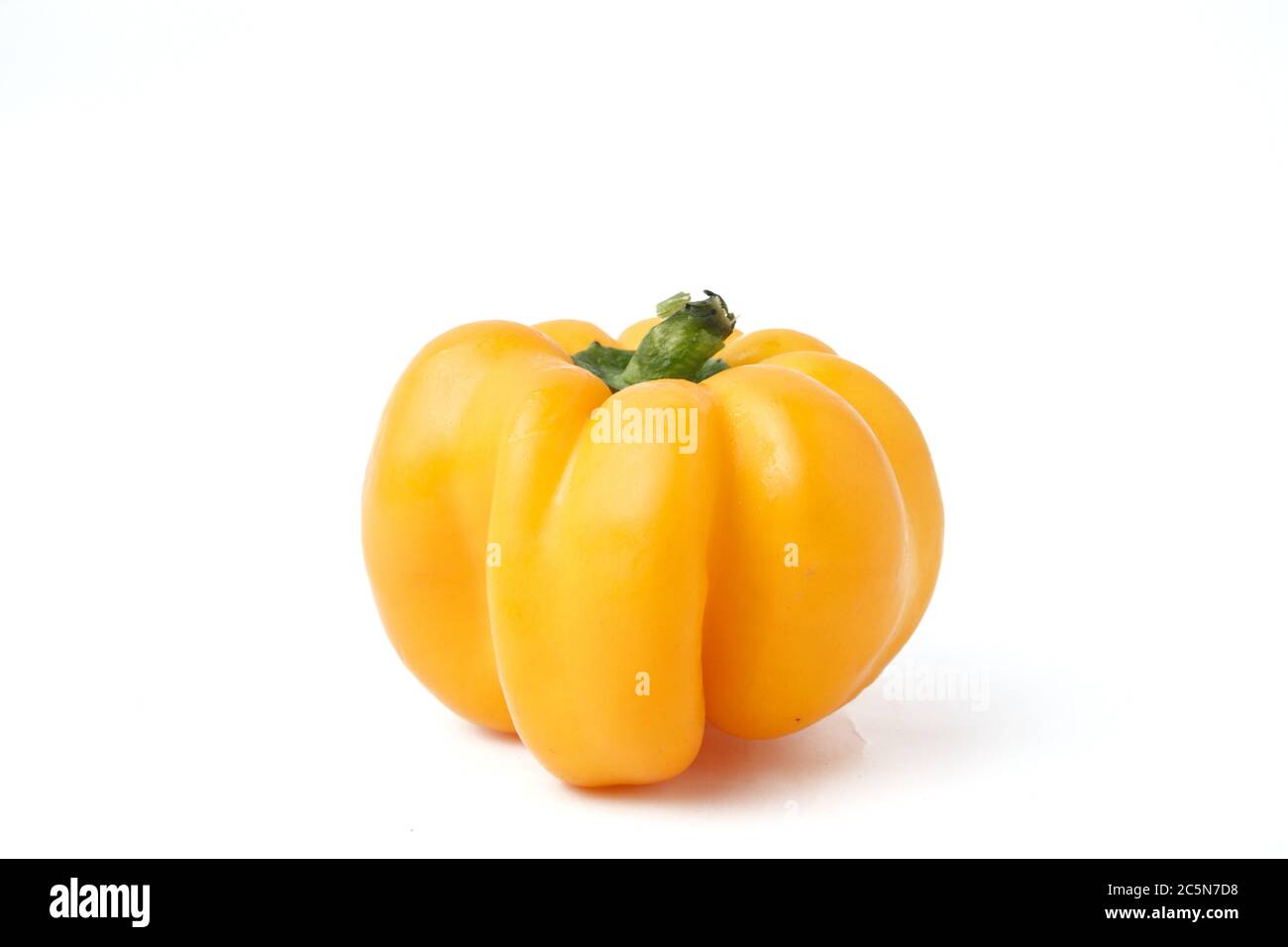 Three multicolored paprikas on Wight background Stock Photo Alamy