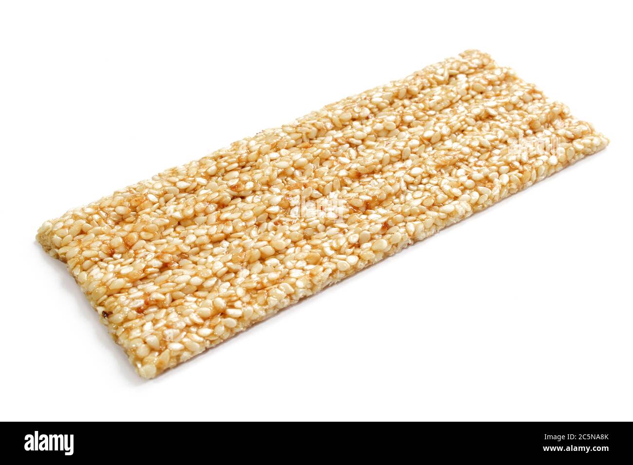 Sesame nut bar with honey isolated on white background Stock Photo Alamy