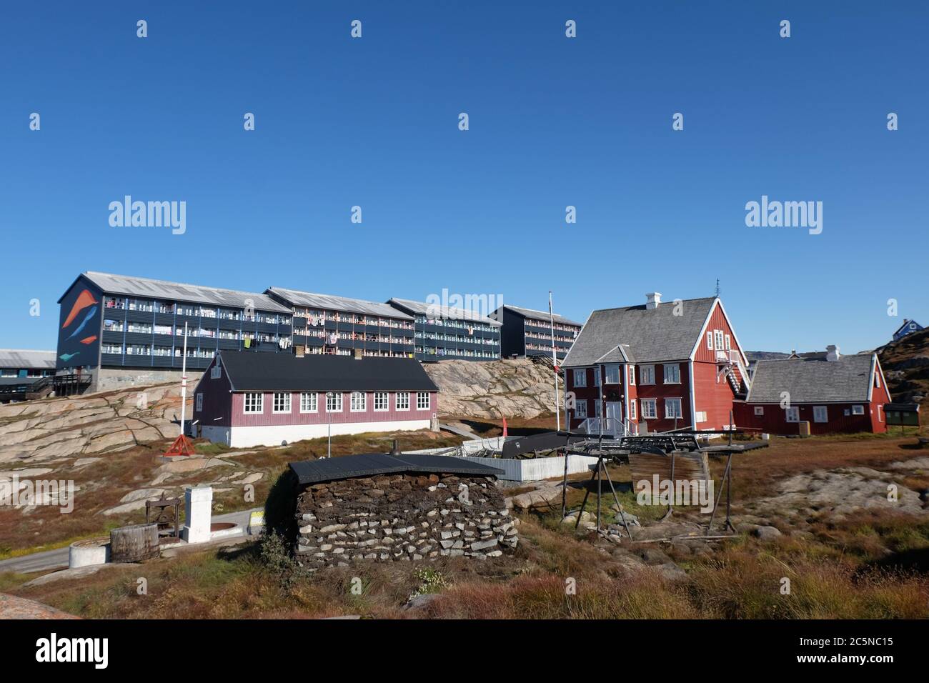 Greenlandic dwellings through the ages from stone and turf, to Knud Rasmussen's 19th century home to modern apartment blocks. Stock Photo