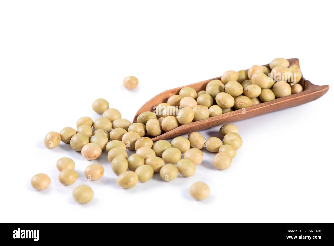 Yellowgreen Taiwanese organic nonGMO soybeans, soy beans in a container isolated on white