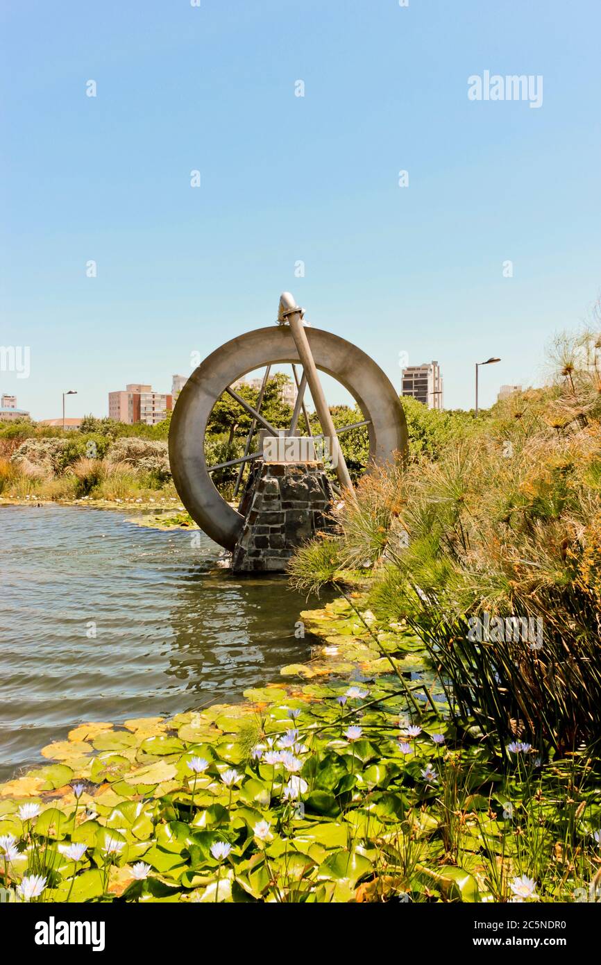 Watermill, mill with water, in the lake or pond in Green Point Park