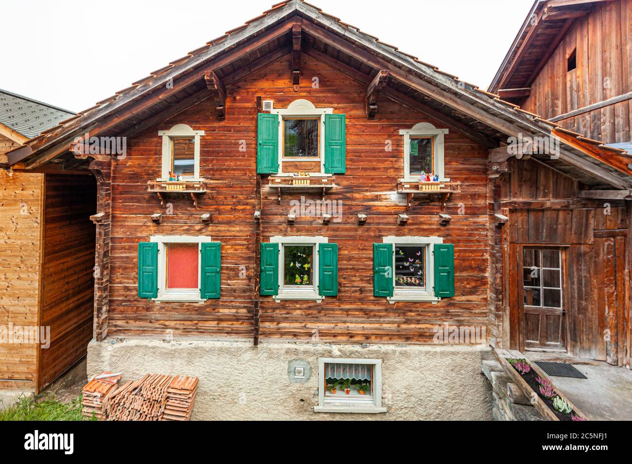 Typical Swiss log house in Tschiertschen-Praden, Switzerland Stock Photo