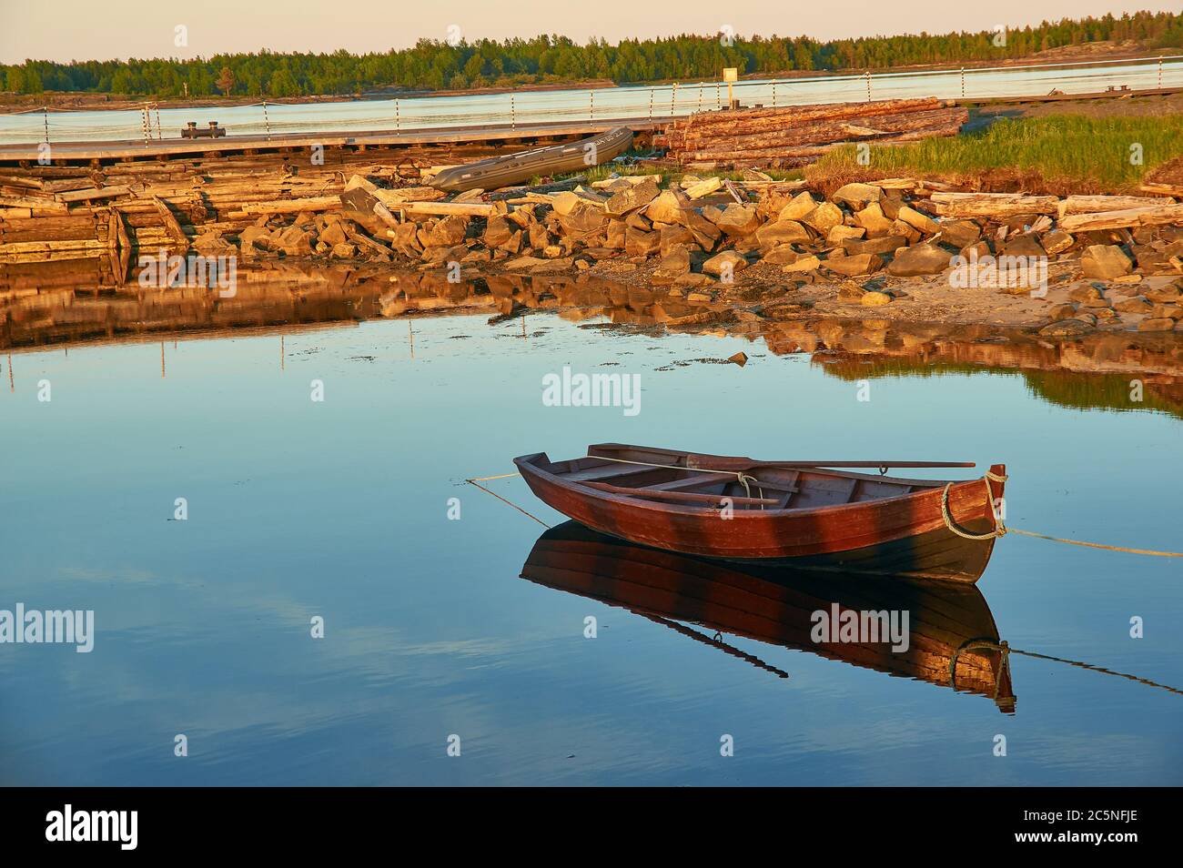 Boat in the village of Rabocheostrovsk, Russia. White Sea near Kem Stock Photo