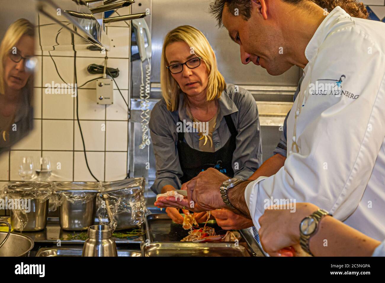 Cooking class of Michelin Star Chef Thomas Kellermann in Wernberg-Köblitz, Germany Stock Photo