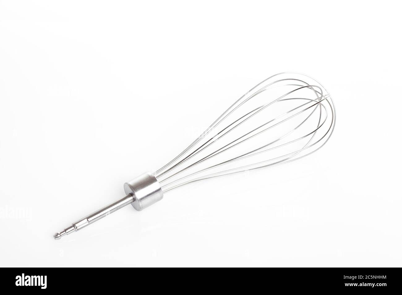 a whisk for whipping cream a nozzle for an electro blender on a white