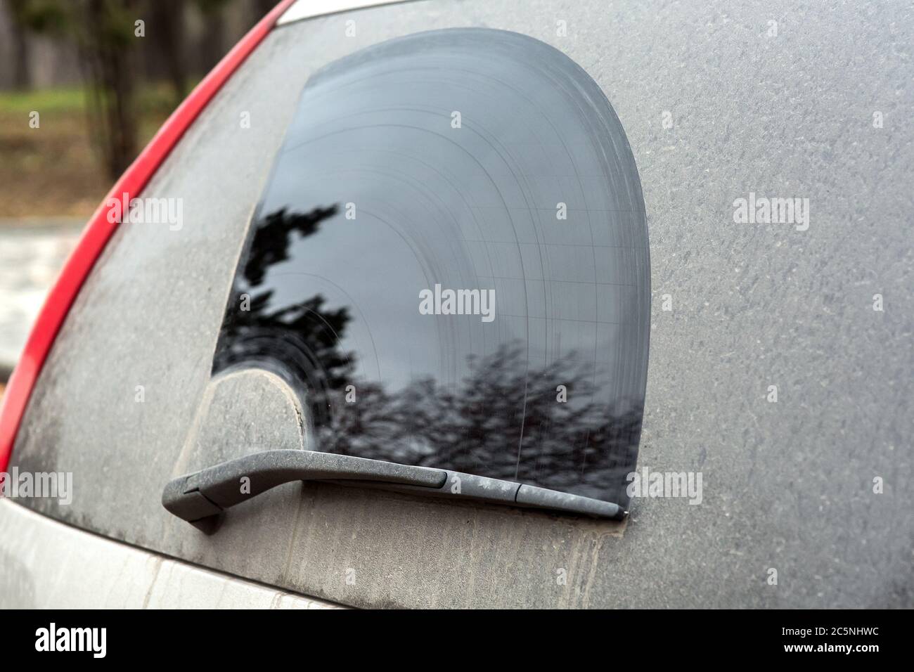 Dirpy Side View Rear window side view of a dirty car with a wiper Stock Photo - Alamy