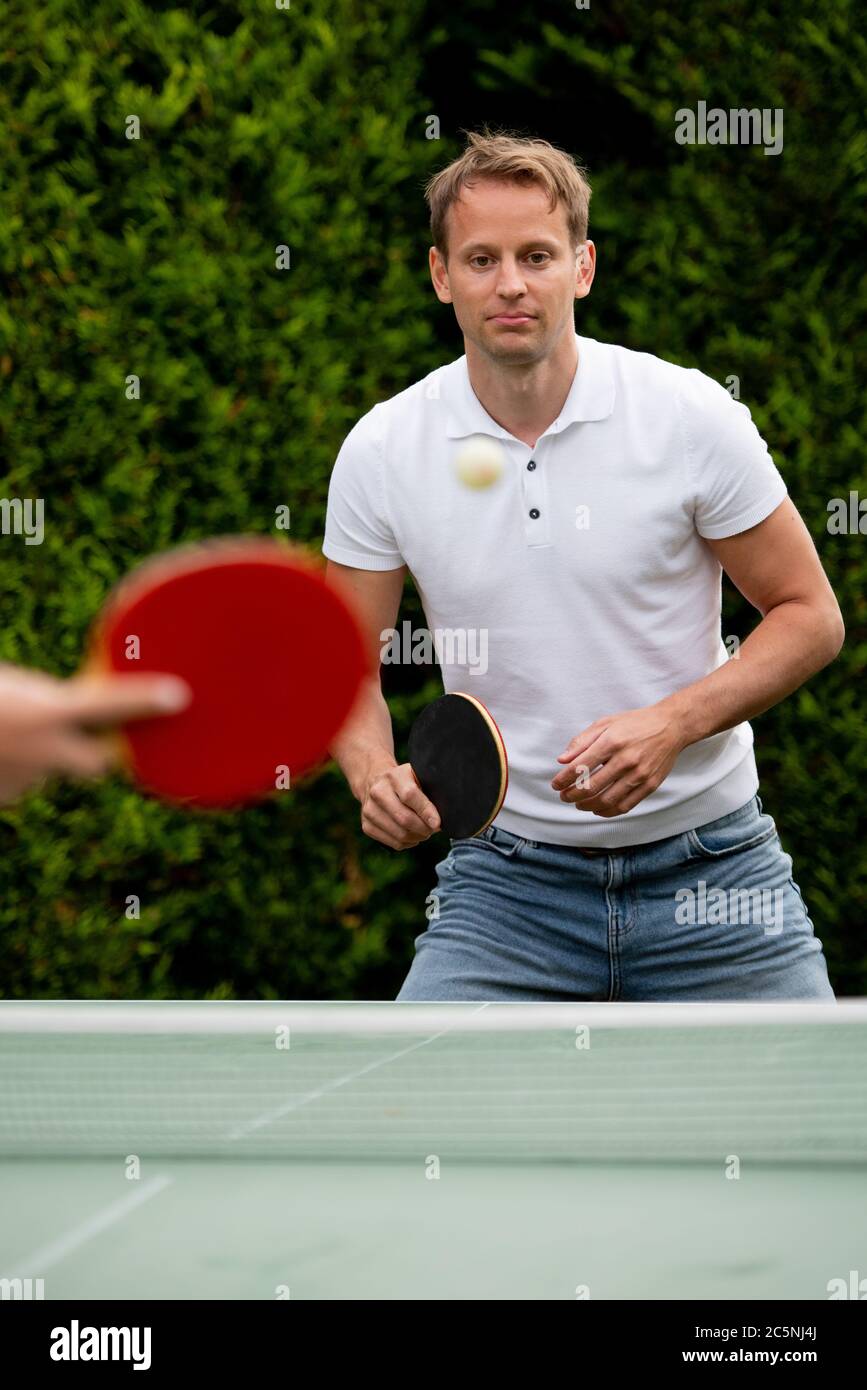 playing table tennis man sporty people hobby ping pong Stock Photo Alamy