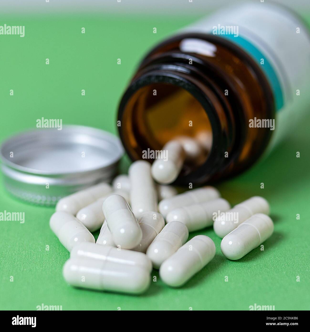 A lot of capsules, pills on the table close up Stock Photo