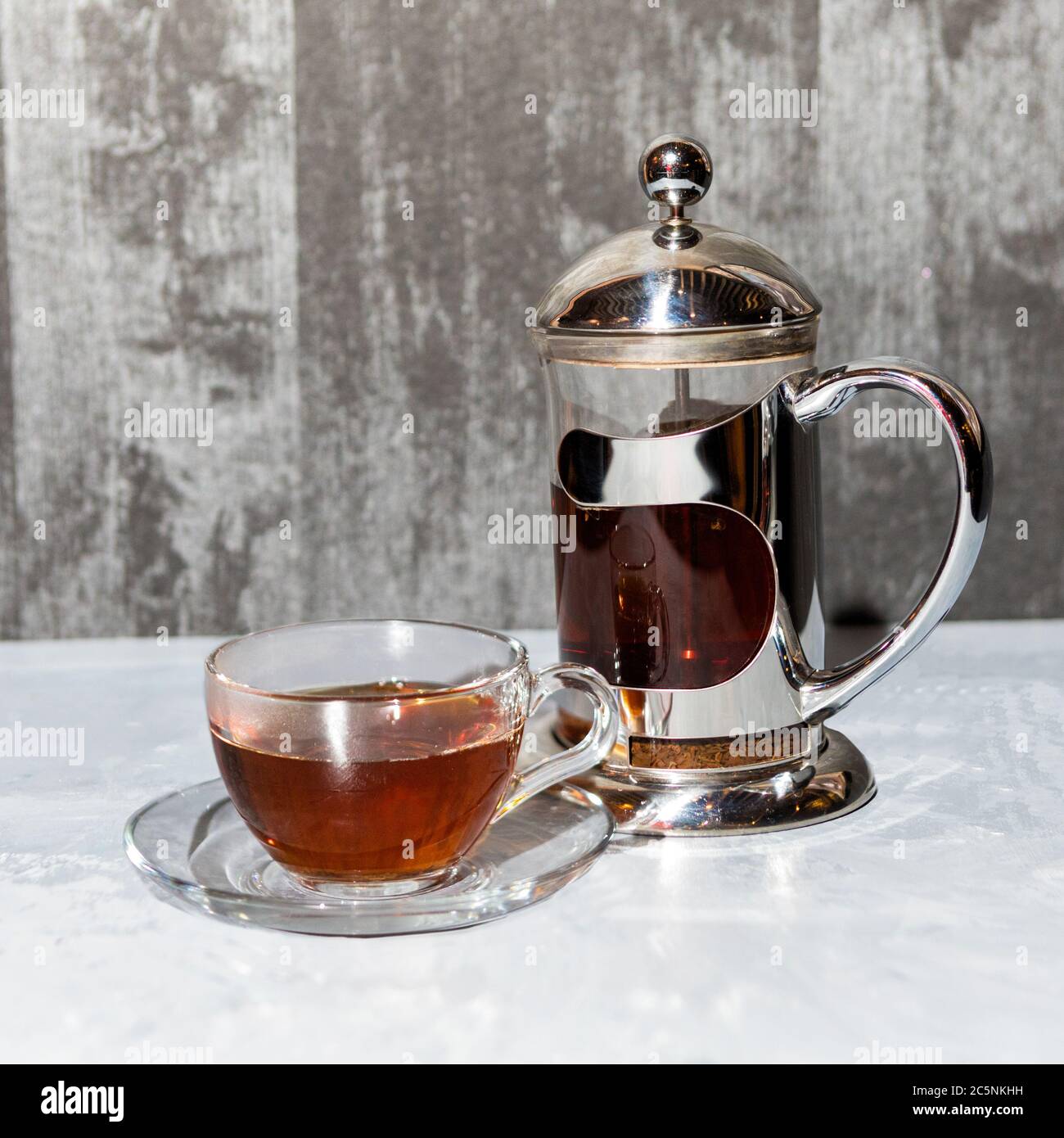 Cups and saucer, tea set on silver background Stock Photo
