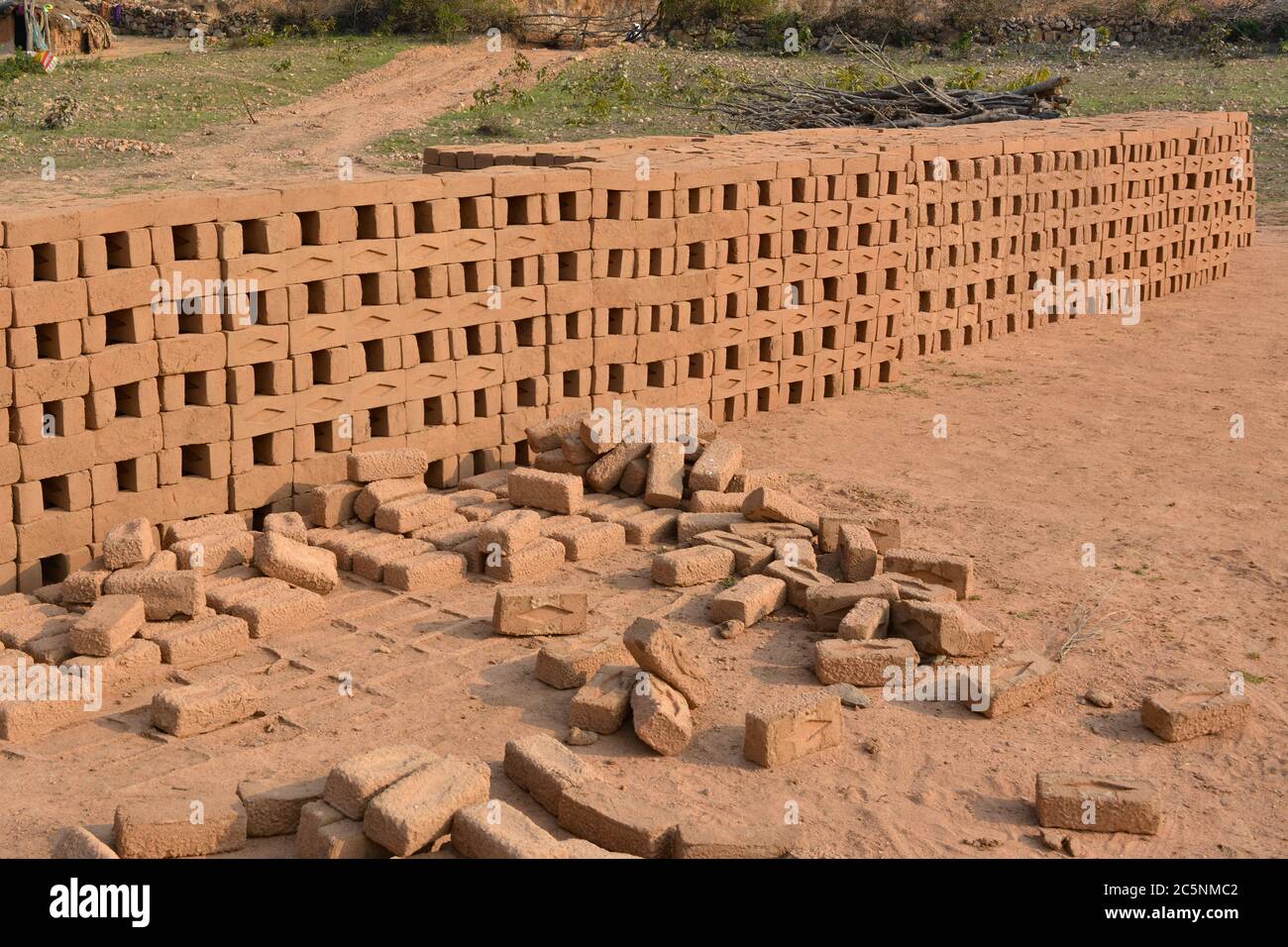 Raw brick laid out in stacks for drying. Bricks in a brick factory