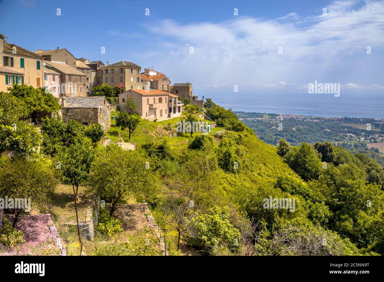 Mountain Village of San-nicolao with view over the mediteranean sea on Corsica, France Stock Photo