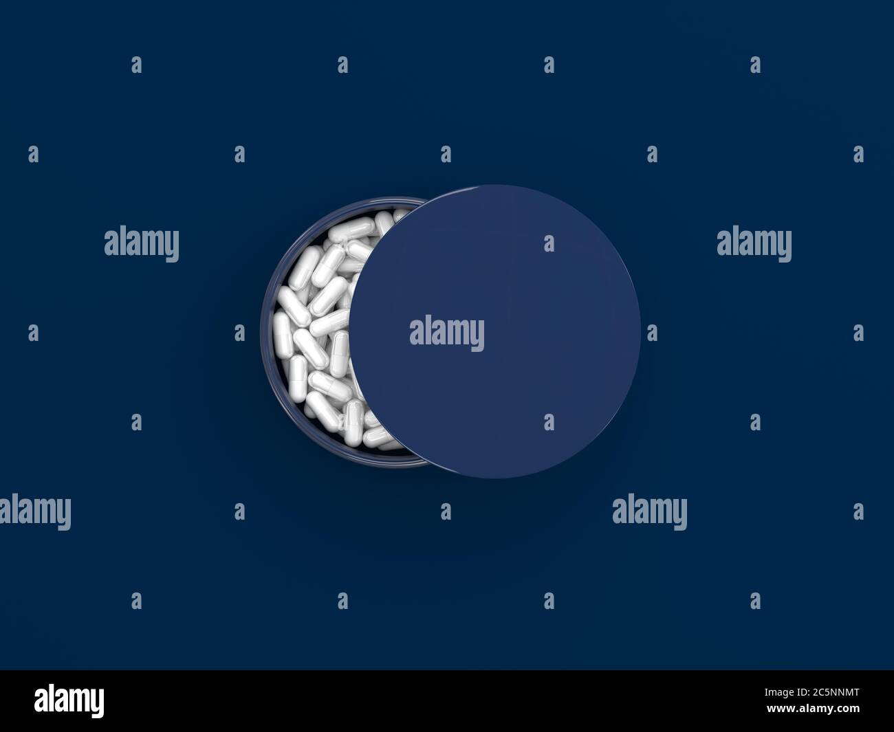 Packing sleeping pills on a dark blue background. An ajar can with a sleeping pill forming a half moon shape in a top view. Remedy for insomnia. Creat Stock Photo
