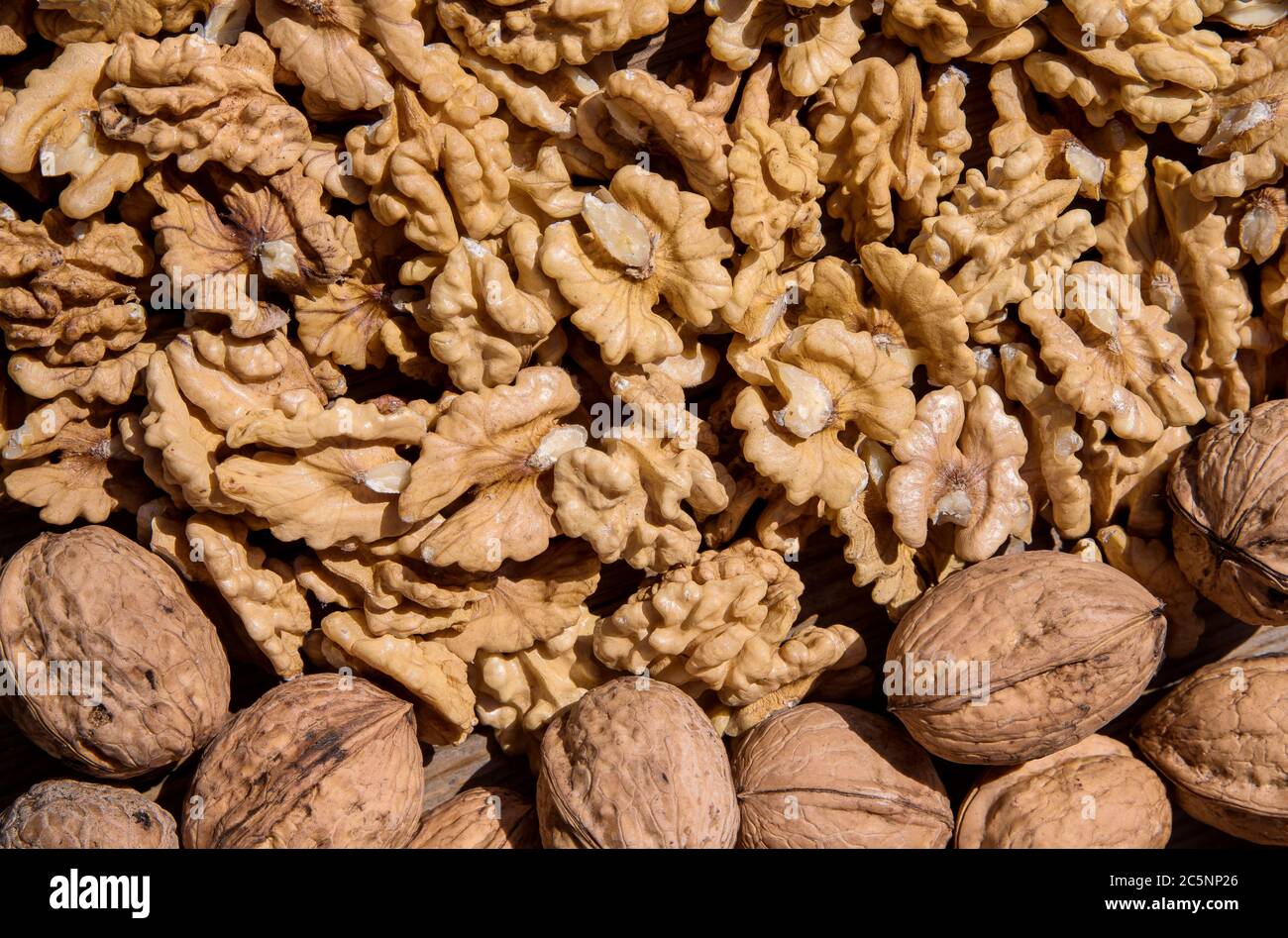 Healthy food. Walnuts whole and nuts Stock Photo Alamy