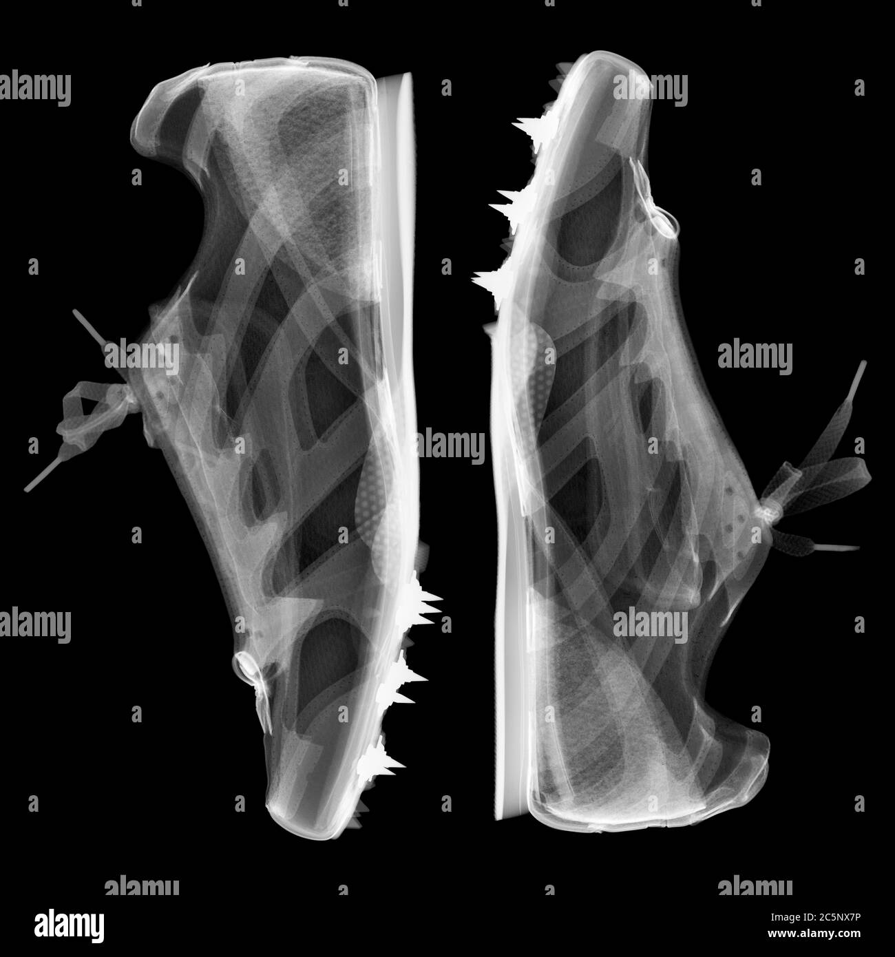 Running shoes with spikes, X-ray. Stock Photo
