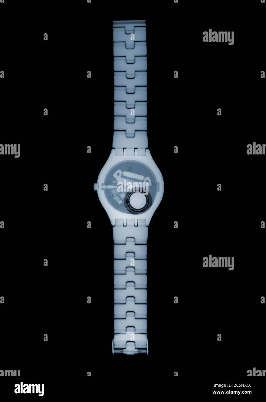 Wrist watch, coloured X-ray. Stock Photo