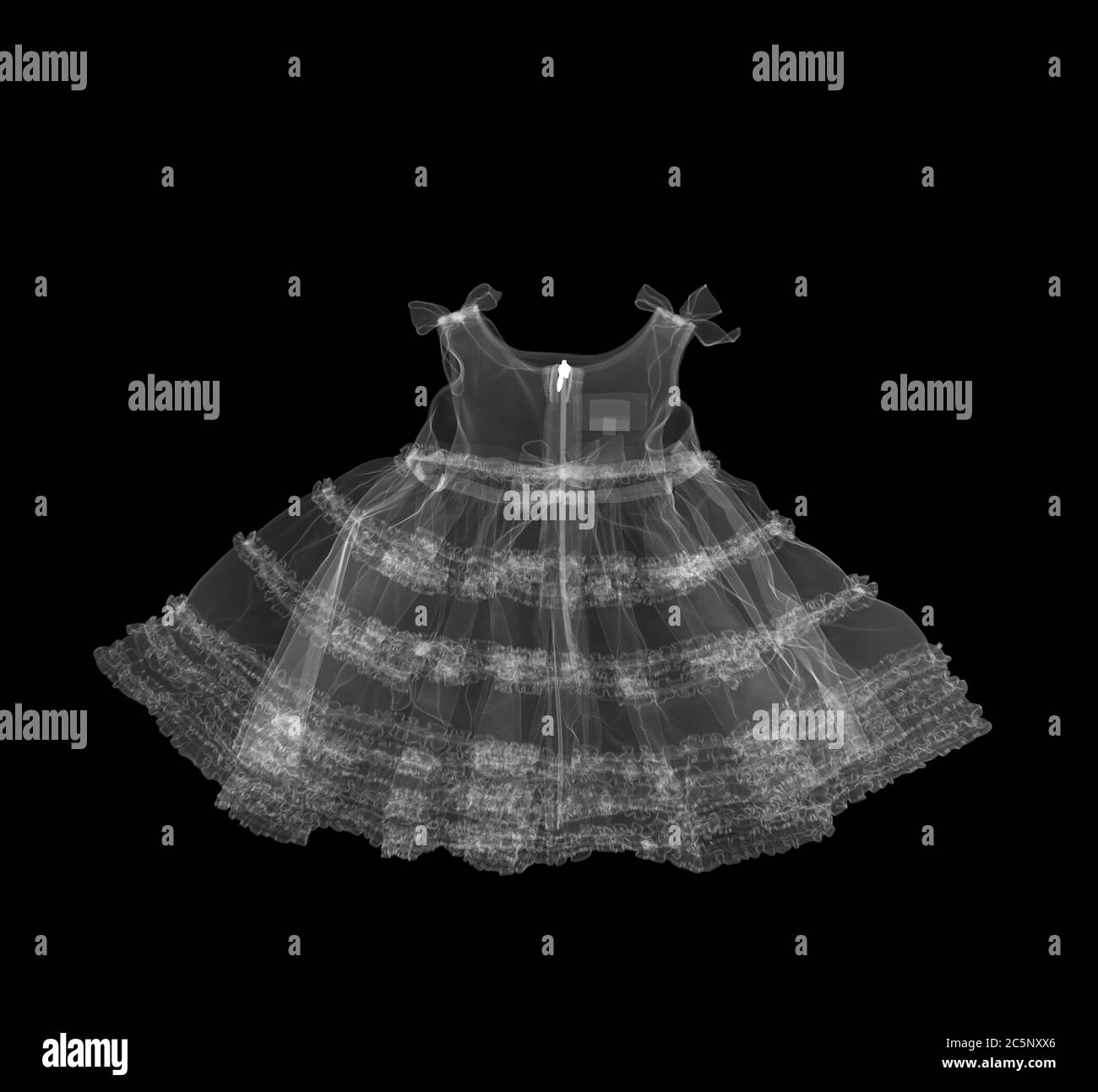 Childs christening dress, X-ray. Stock Photo