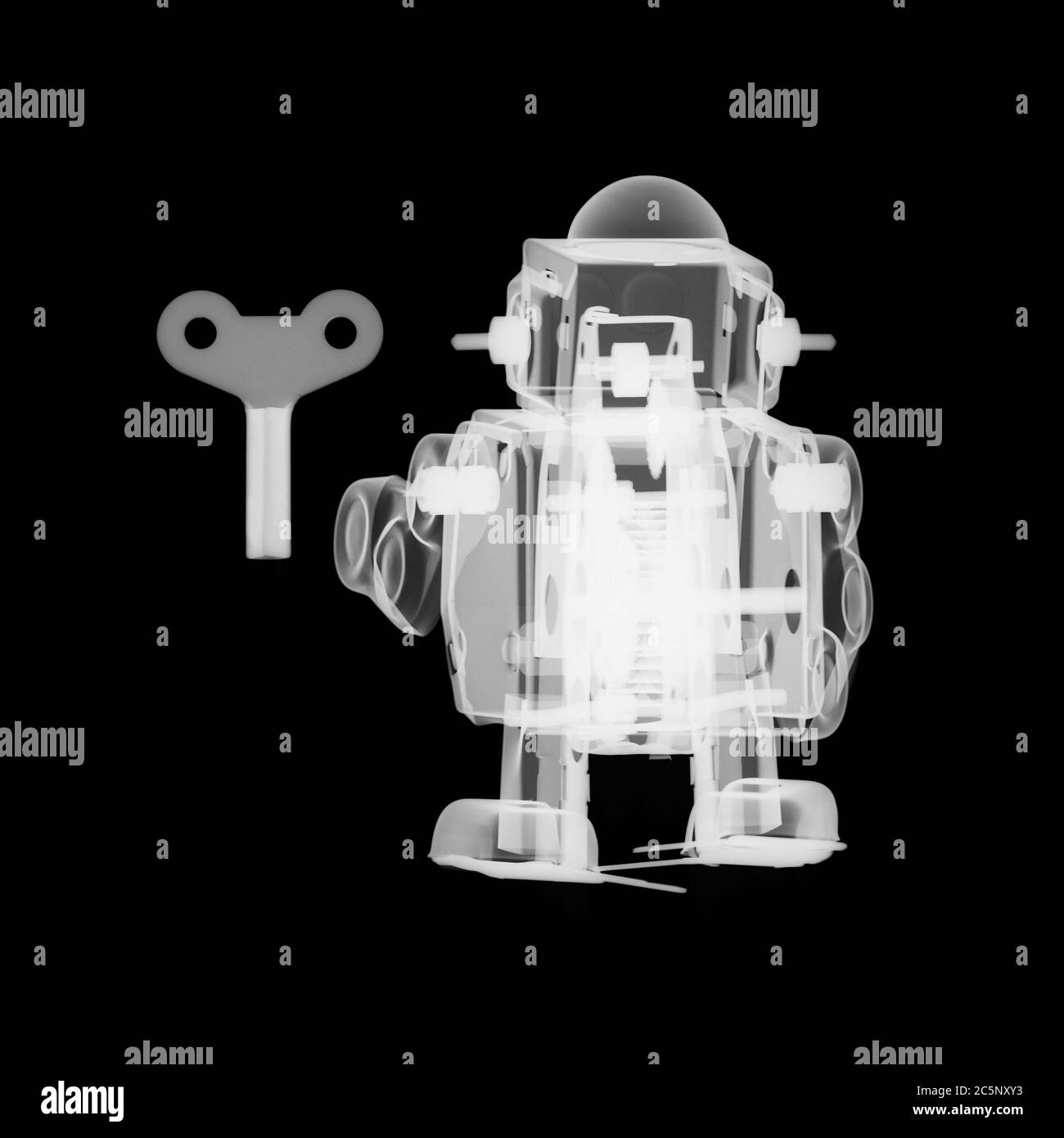 Toy metal robot and key, X-ray. Stock Photo