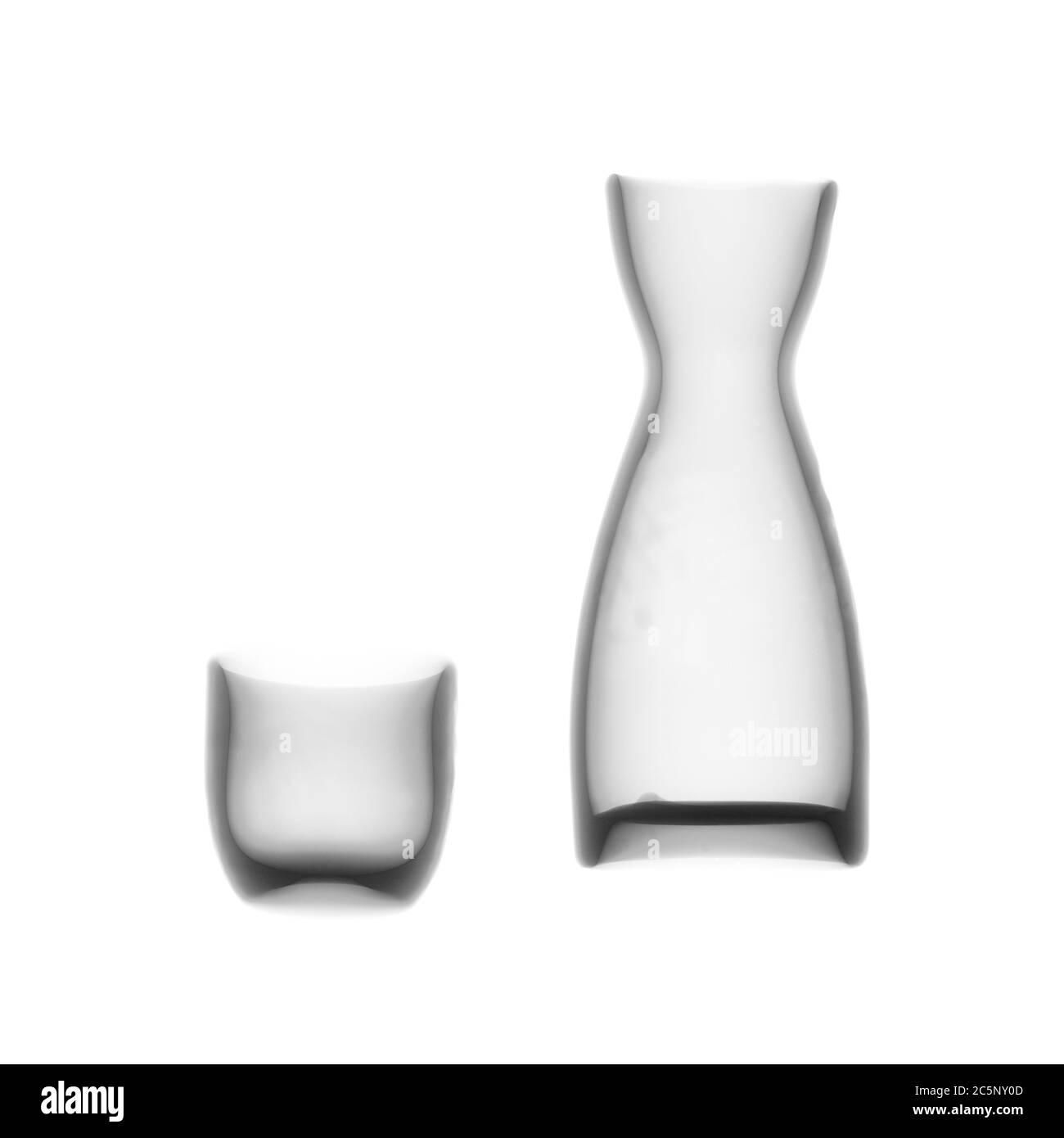 Glass water carafe and glass tumbler, X-ray. Stock Photo