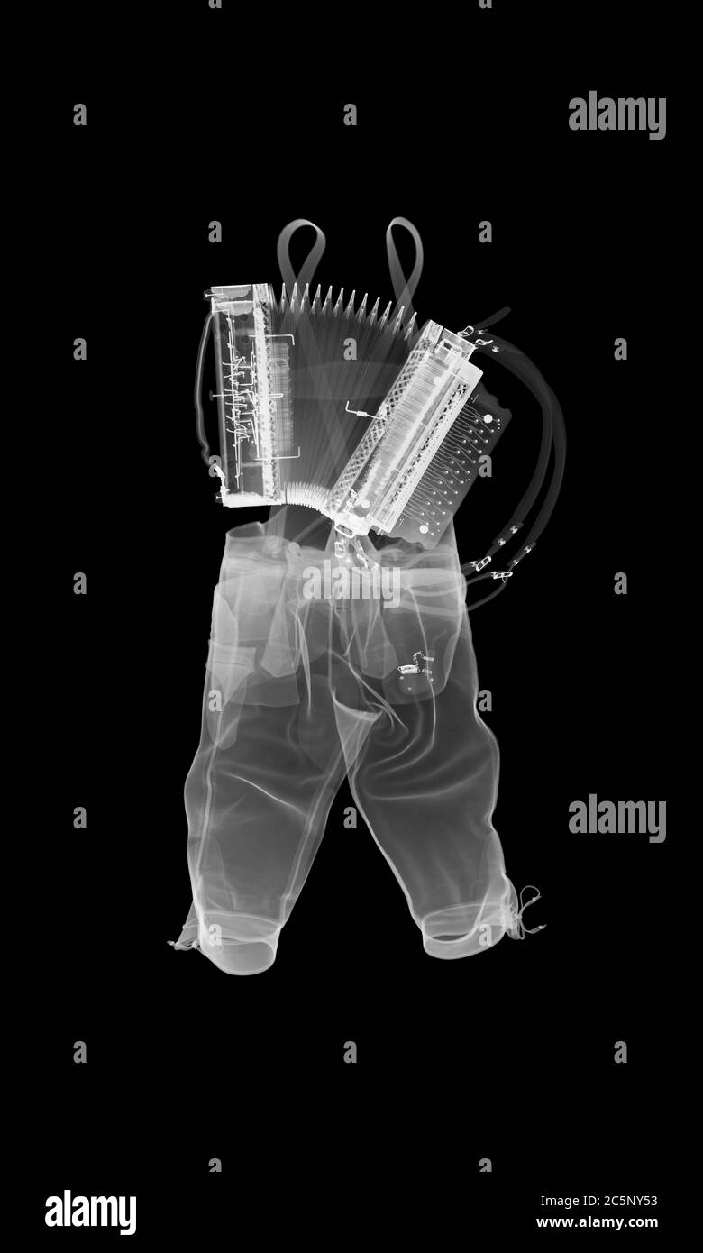 Lederhosen and piano accordion, X-ray. Stock Photo