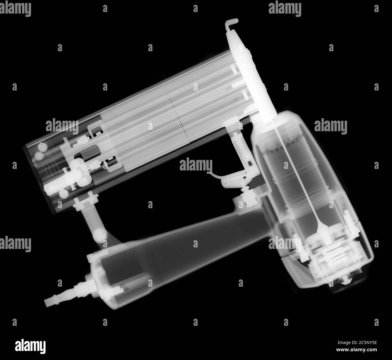 Small nail gun, X-ray. Stock Photo