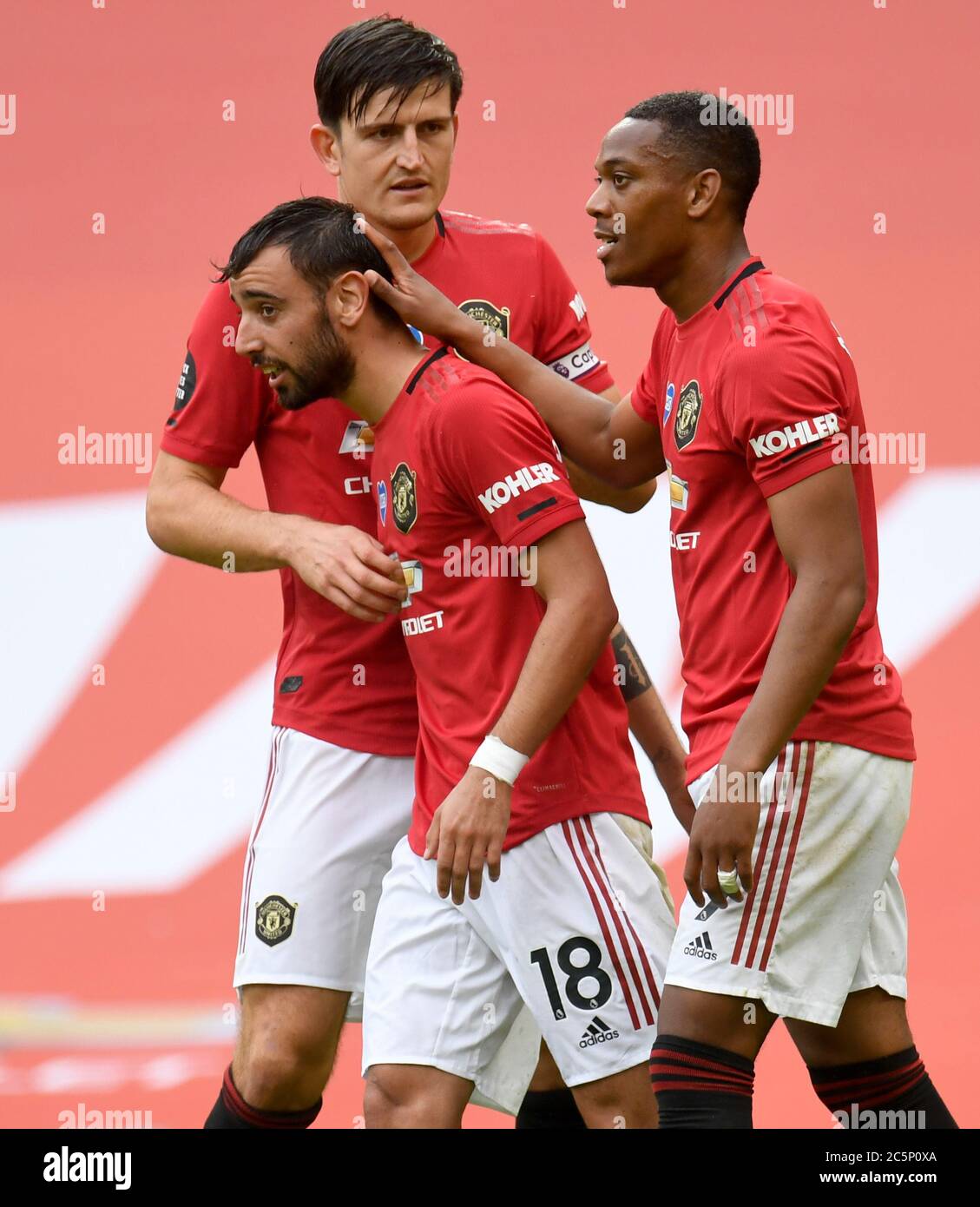 Manchester United's Bruno Fernandes (18) celebrates scoring his
