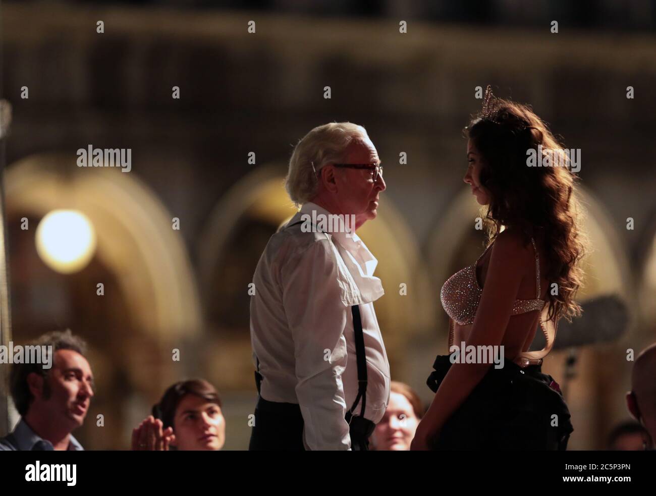 VENICE, ITALY 01 JULY 2014: Mădălina Diana Ghenea and Michael Caine during the recording of the movie "Youth" in Venice, Italy Stock Photo