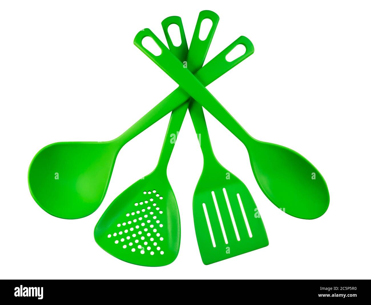 Green plastic kitchen utensils isolated on white. Clipping path