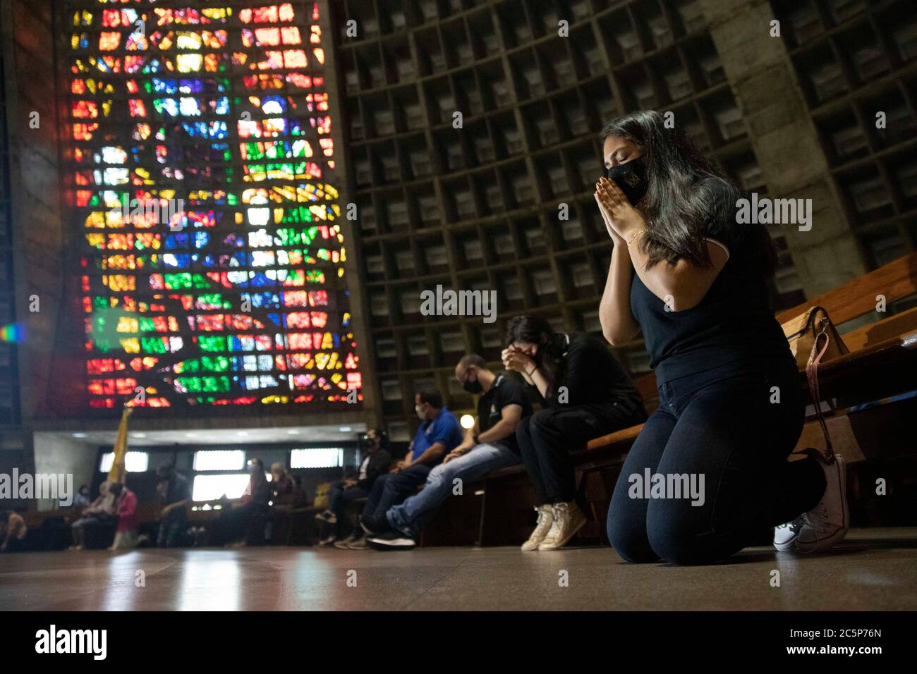 Rio de Janeiro, Brazil. 04th July, 2020. Faithful using masks attend the mass of reopening of religious ceremonies in the Catholic churches of Rio de Janeiro, celebrated by Cardinal Archbishop Dom Orani Tempesta, in the Metropolitan Cathedral, in downtown Rio. Since March without presencial masses, the Catholic churches of the city reopen this Saturday (04), with the participation of the faithful reduced to 1/3 in order to avoid agglomeration. Brazil registered more than 63 thousand deaths and 1.5 million contaminations as a result of Covid-19. Credit: ZUMA Press, Inc./Alamy Live News Stock Photo