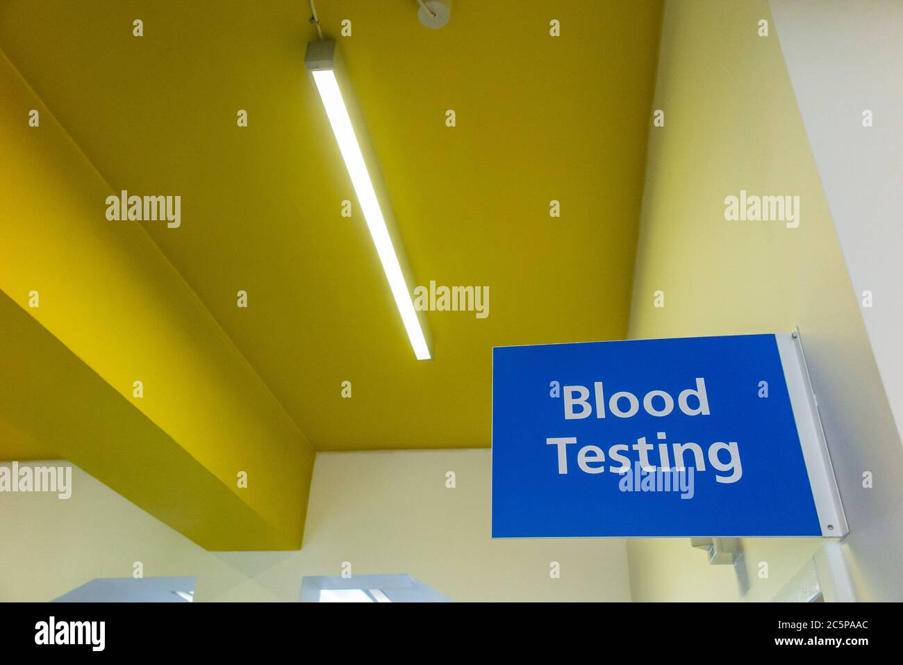 A Blood Testing sign in an NHS drop in centre Stock Photo Alamy