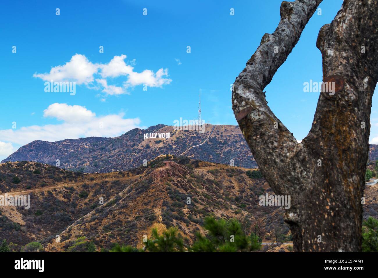 LOS ANGELES, CALIFORNIA - OCTOBER 27, 2016: Hollywood sign under a blue sky with clouds, California Stock Photo