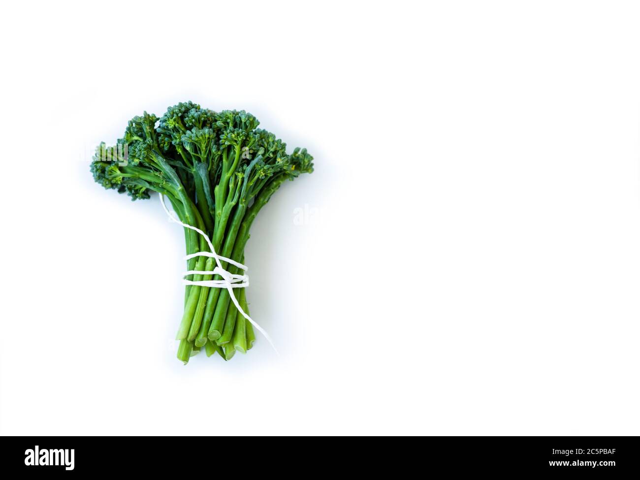 Fresh broccolini isolated on white background with copy space Stock Photo