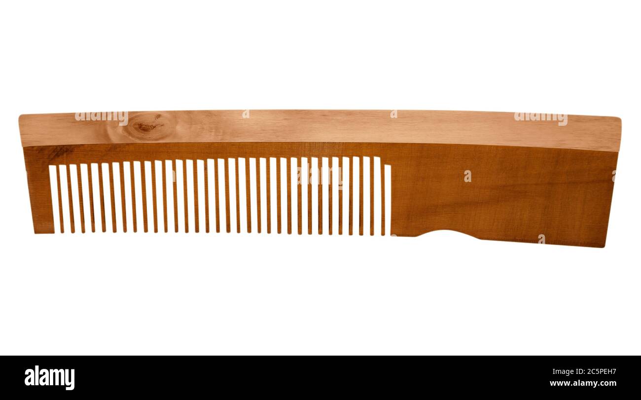 Wooden comb isolated on a white background. Clipping path included ...
