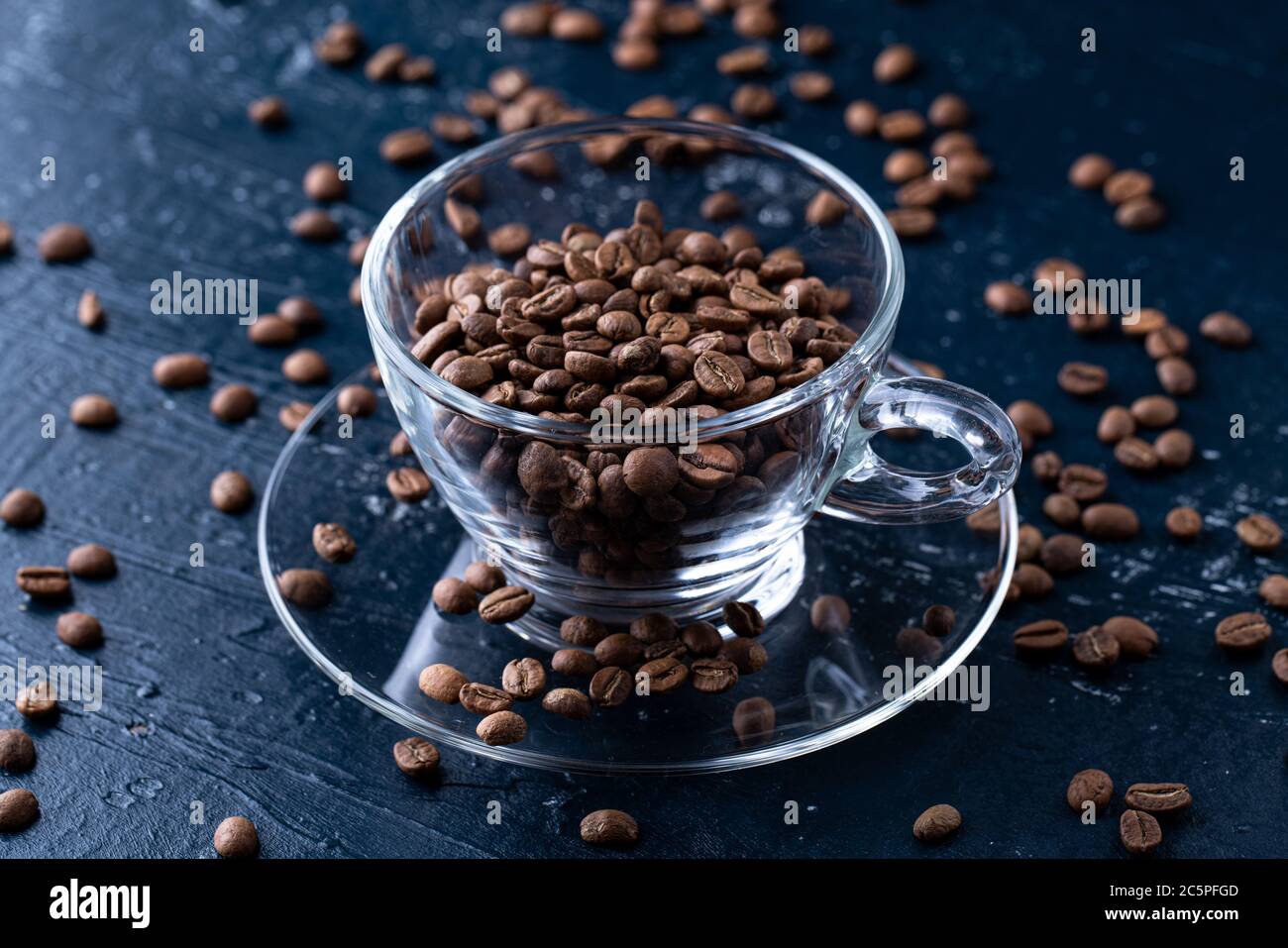 hole coffee beans in a cup Stock Photo