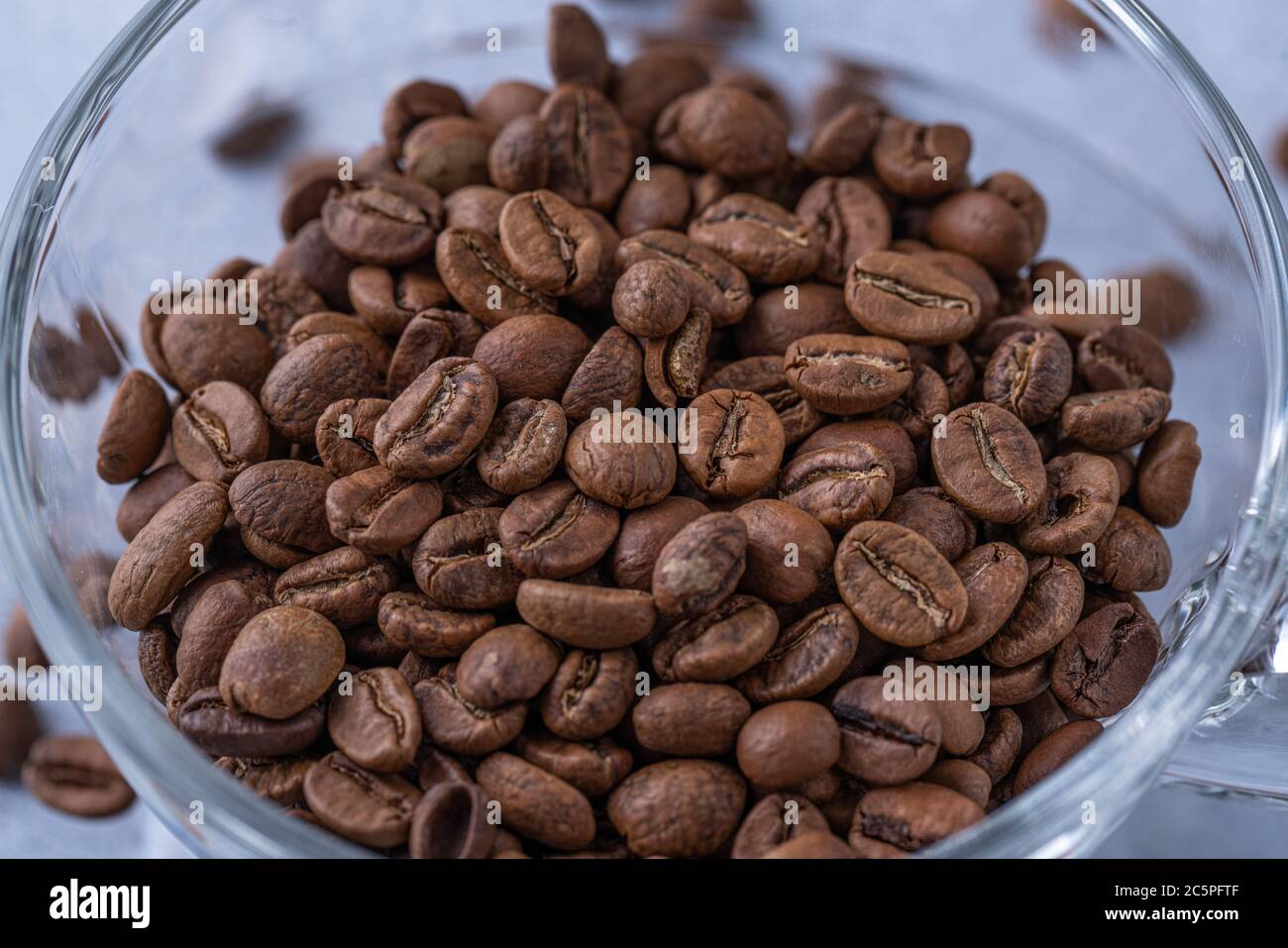 hole coffee beans in a cup Stock Photo