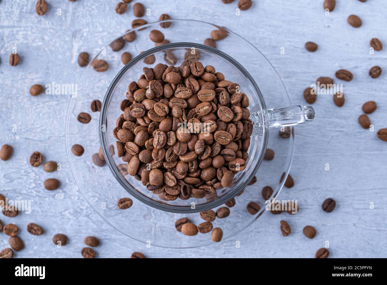 hole coffee beans in a cup Stock Photo