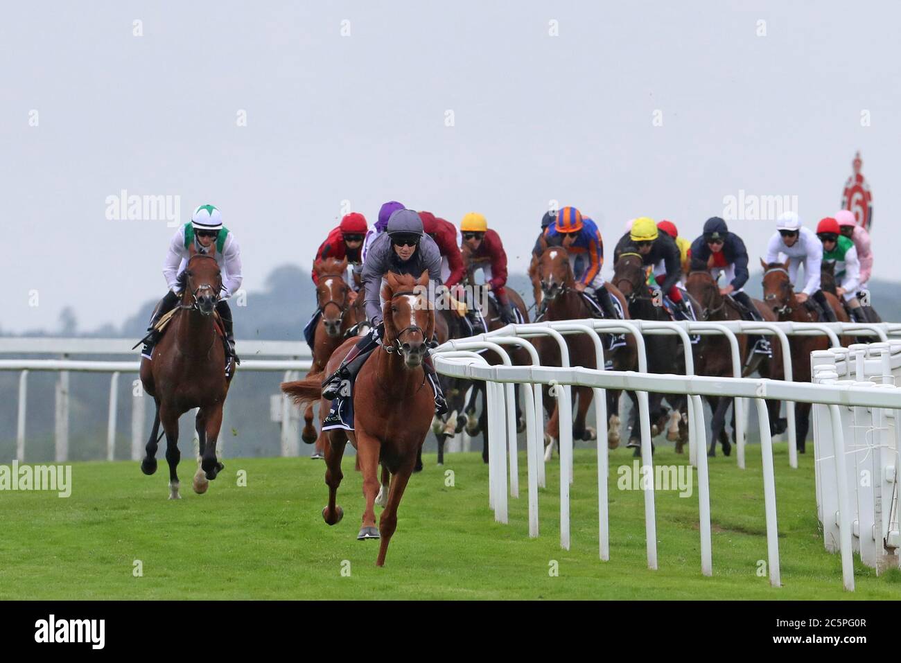 EPSOM, ENGLAND. JULY 4TH - Serpentine and EJ McNamara lead The Derby from the outset on Epsom Downs during the 241st Epsom Derby which was postponed on June 6th and was contested behind closed doors due to the COVID-19 Pandemic (Credit: Jon Bromley | MI News) Credit: MI News & Sport /Alamy Live News Stock Photo