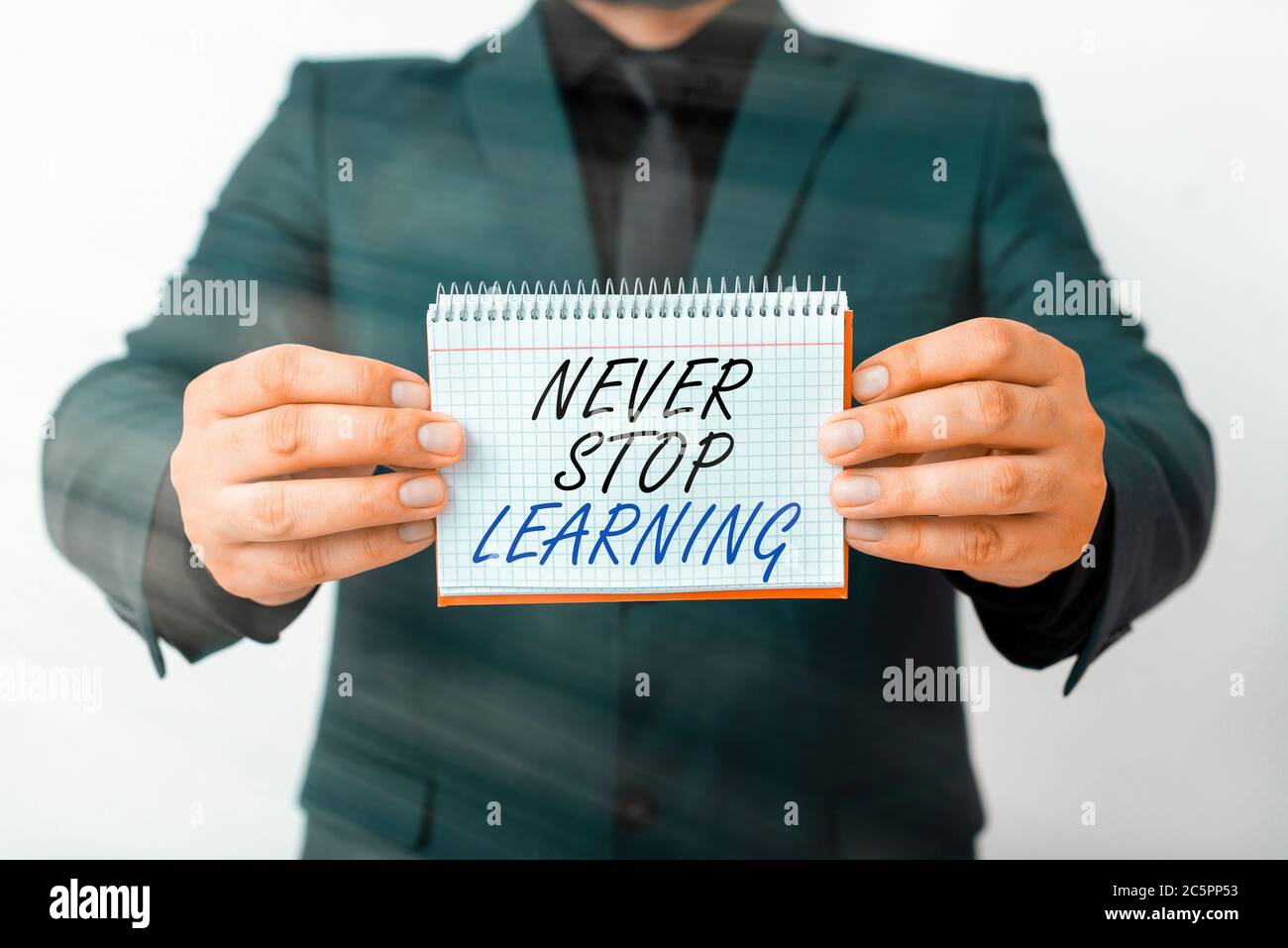 Writing note showing Never Stop Learning. Business concept for ...