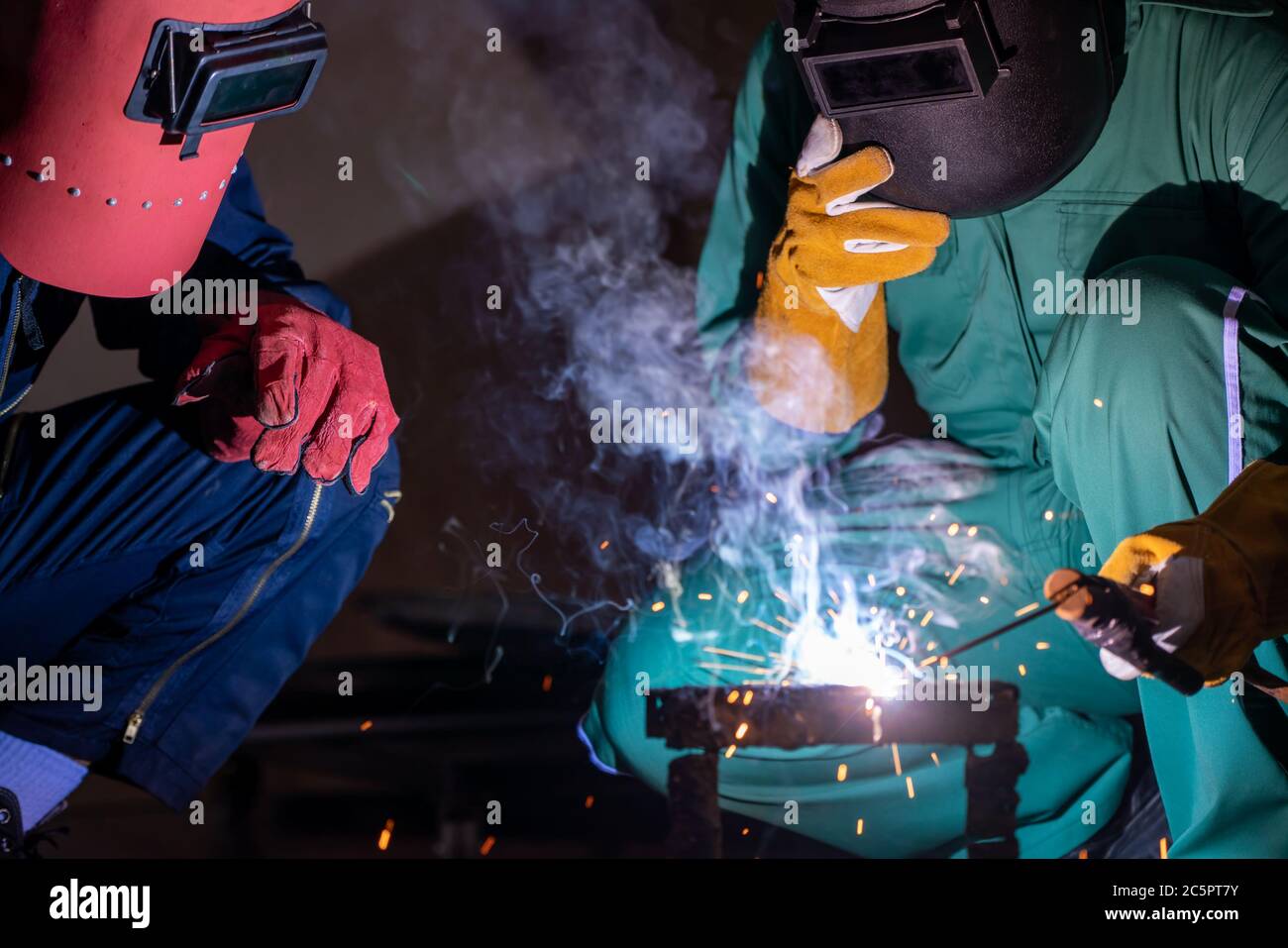 Metal welding steel works using electric arc welding machine Stock