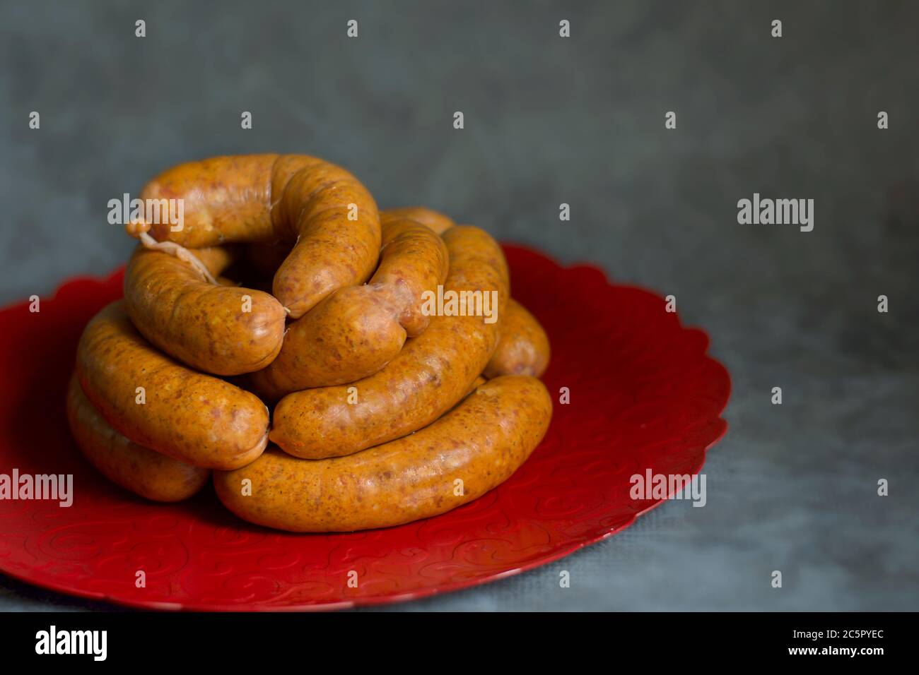 Raw handmade sausages Stock Photo
