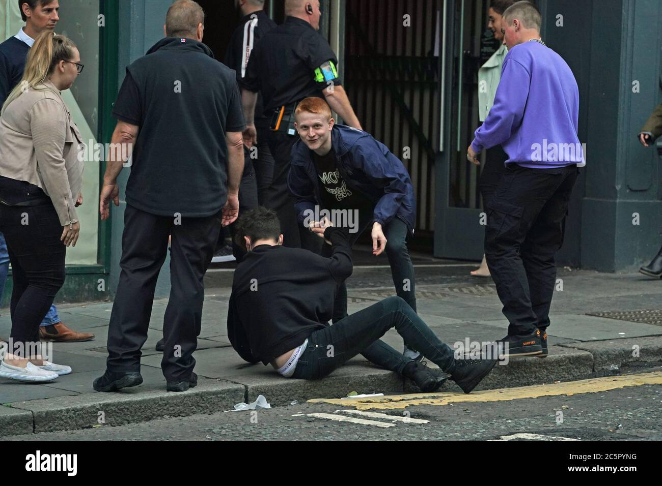 People in the Bigg Market area of Newcastle, where pubs and bars have reopened following the easing of coronavirus lockdown restrictions across England. Stock Photo