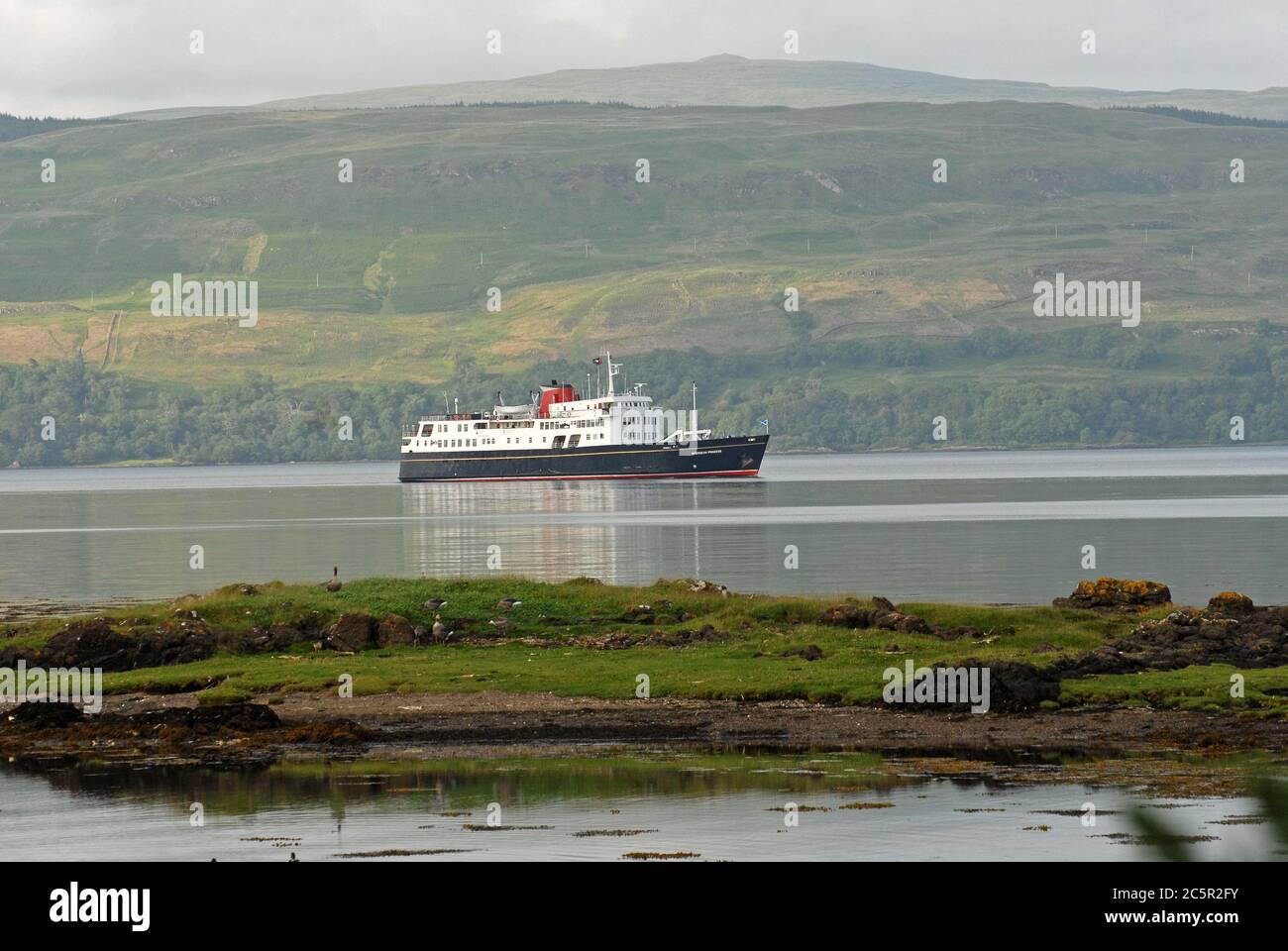 HEBRIDEAN PRINCESS approaching her overnight anchorage in SALEN BAY, SOUND OF MULL, ISLE OF MULL, SCOTLAND Stock Photo