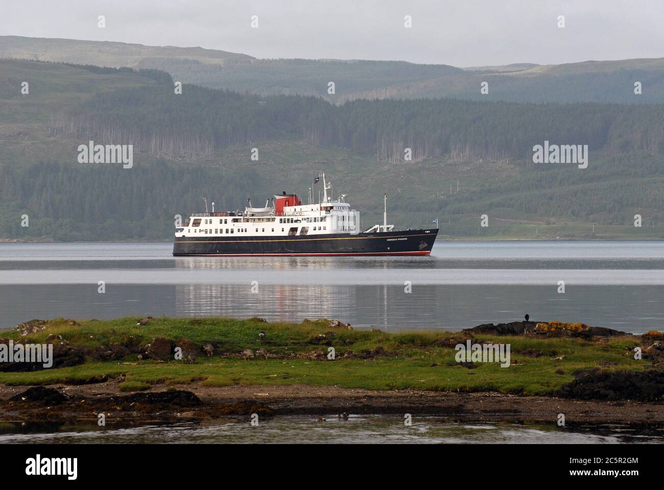 HEBRIDEAN PRINCESS approaching her overnight anchorage in SALEN BAY, SOUND OF MULL, ISLE OF MULL, SCOTLAND Stock Photo