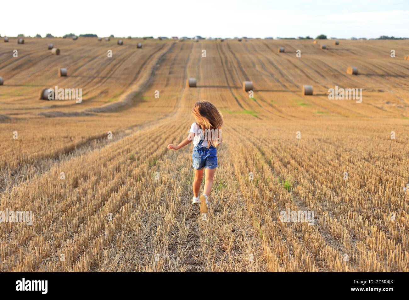Girl in overalls hi-res stock photography and images - Alamy