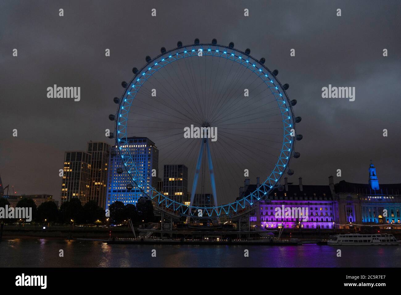 04 July 2020. London, United Kingdom. The London Eye is lit blue to honour and mark the 72nd birthday of the National Health Service. Photo by Ray Tang/Ray Tang Media Stock Photo