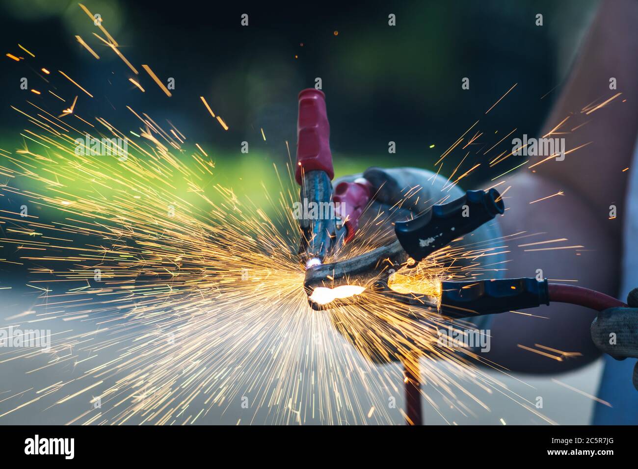 Sparks from car battery connection Stock Photo